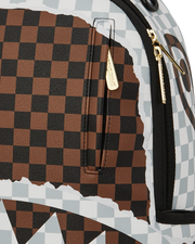 Close-Up View of the Sprayground Cream And Brown Tear Check Backpack