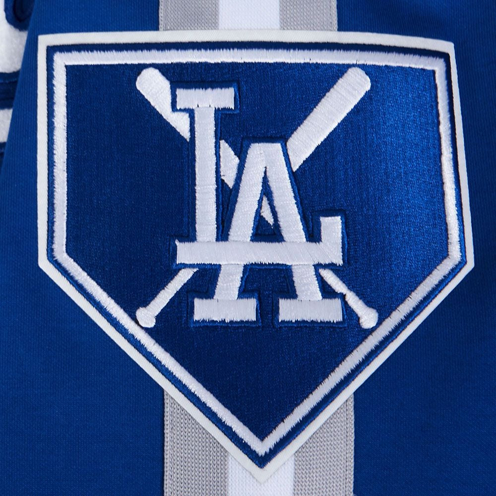 Dodgers Logo with Crossed Bats on the LOS ANGELES DODGERS MEN'S JACKET PRO GAME DAY JACKET in blue