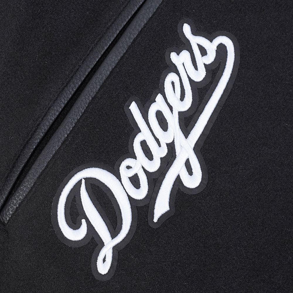 Dodgers Script Logo View of the LOS ANGELES DODGERS MEN'S VARSITY JACKET TEAM BADGE in Black