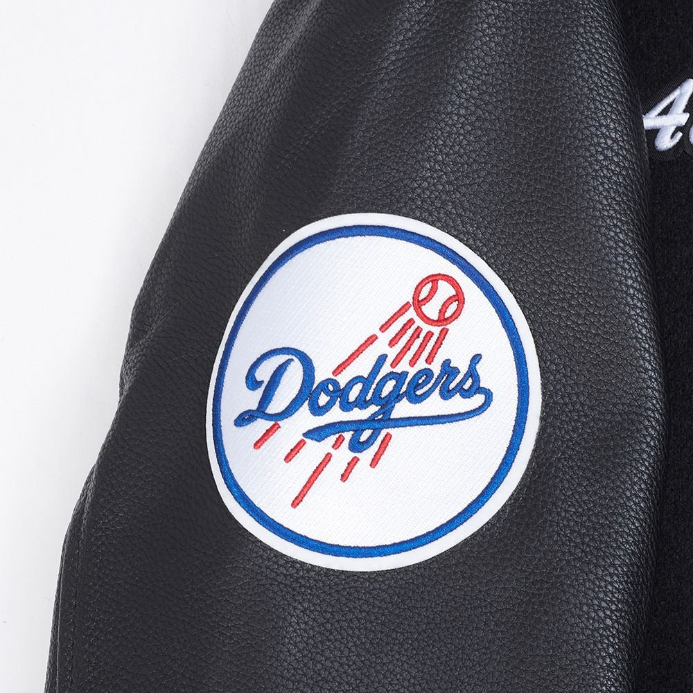 Close-Up View of the Dodgers Baseball Logo LOS ANGELES DODGERS MEN'S VARSITY JACKET TEAM BADGE in Black