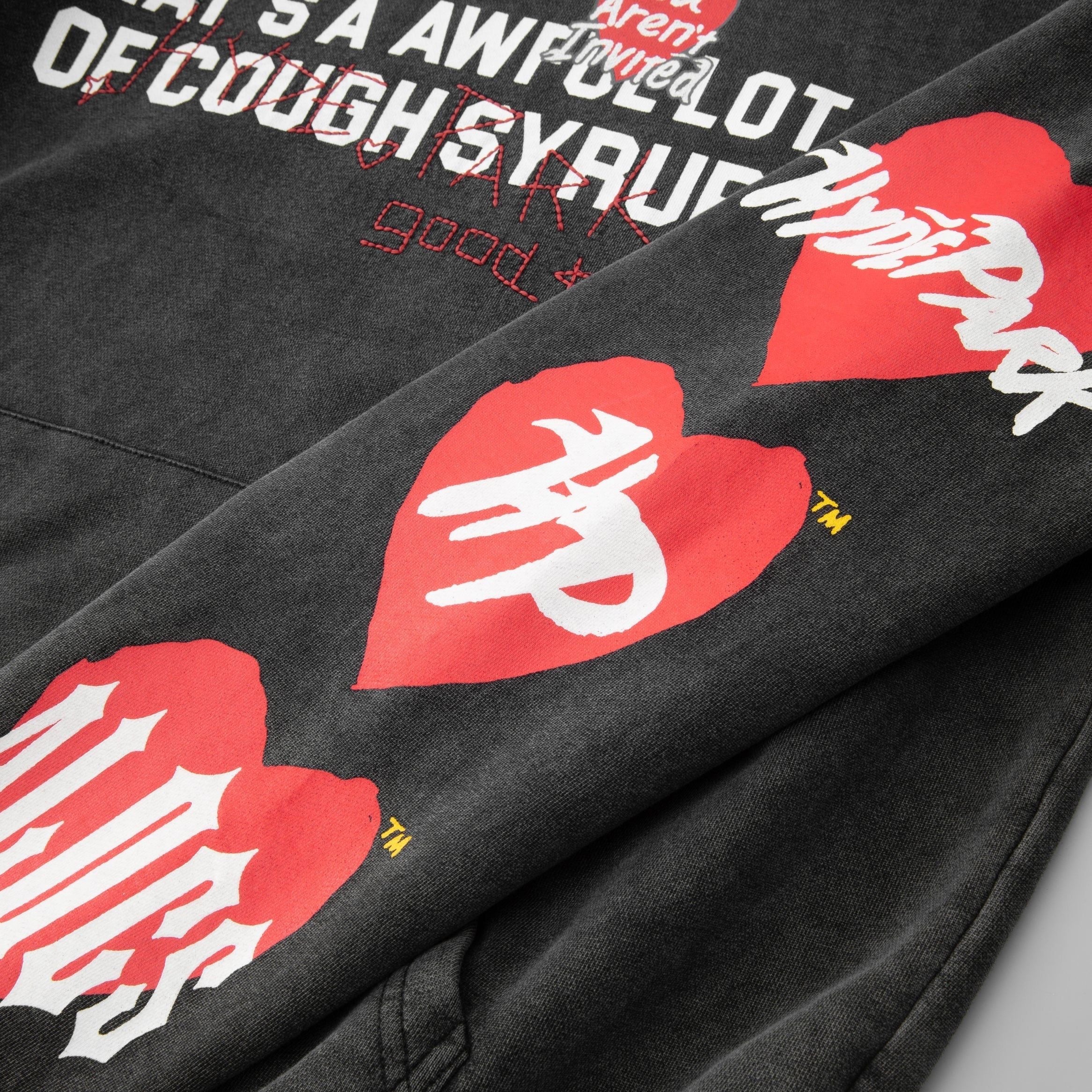 Heart Logo View of the You Aren't ALOCS Hyde Park Hoodie in Black
