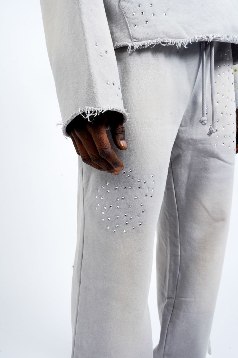 Close-Up View of the Rhinestones on the Paper Money PAPER SWEATPANTS in Grey