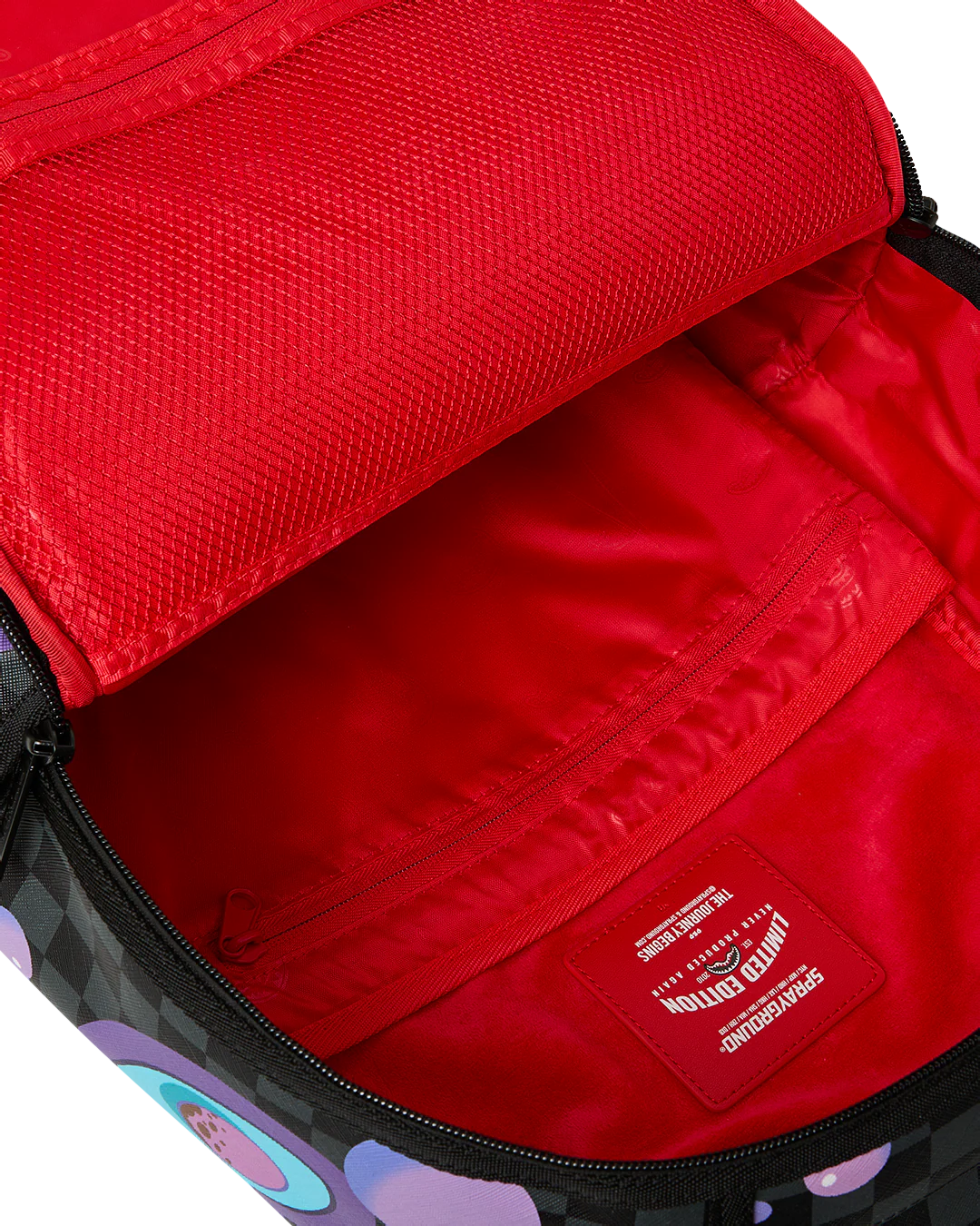 Interior Sleeve View of the Sprayground Purple Slime Takeover Backpack