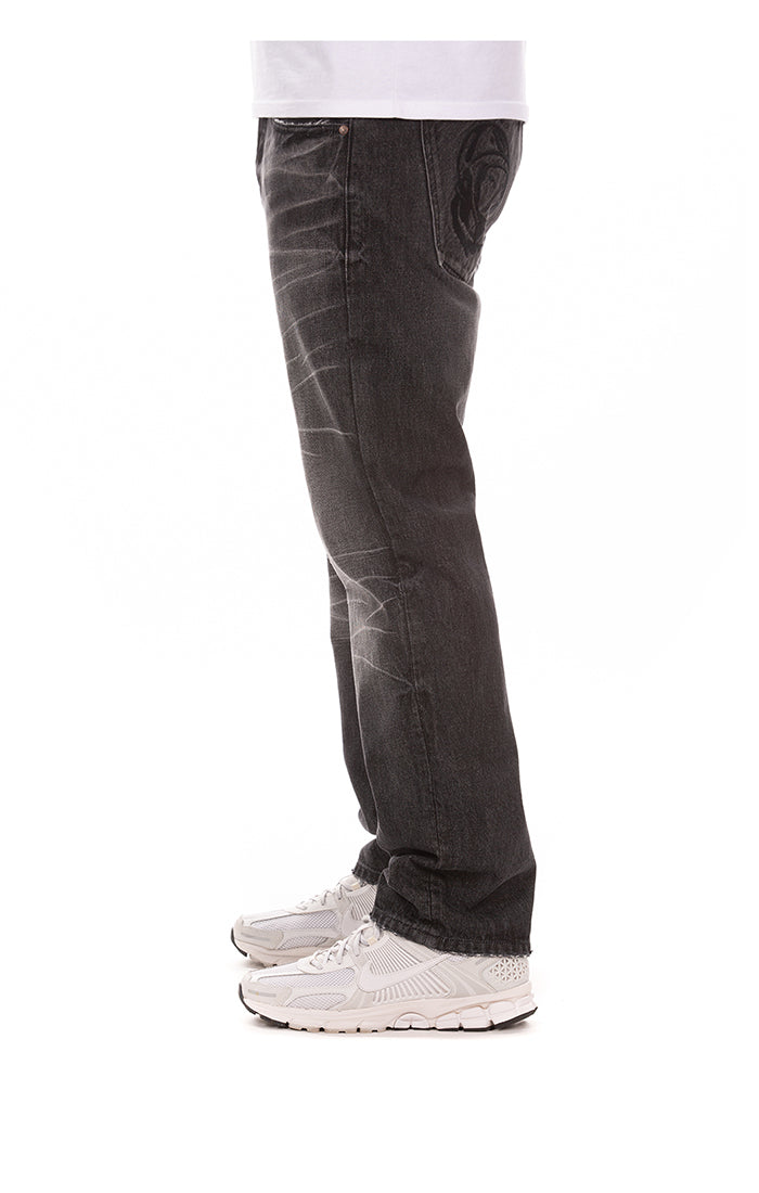 Left View of the Billionaire Boys Club bb dark orbit jeans (heart fit) in black abyss