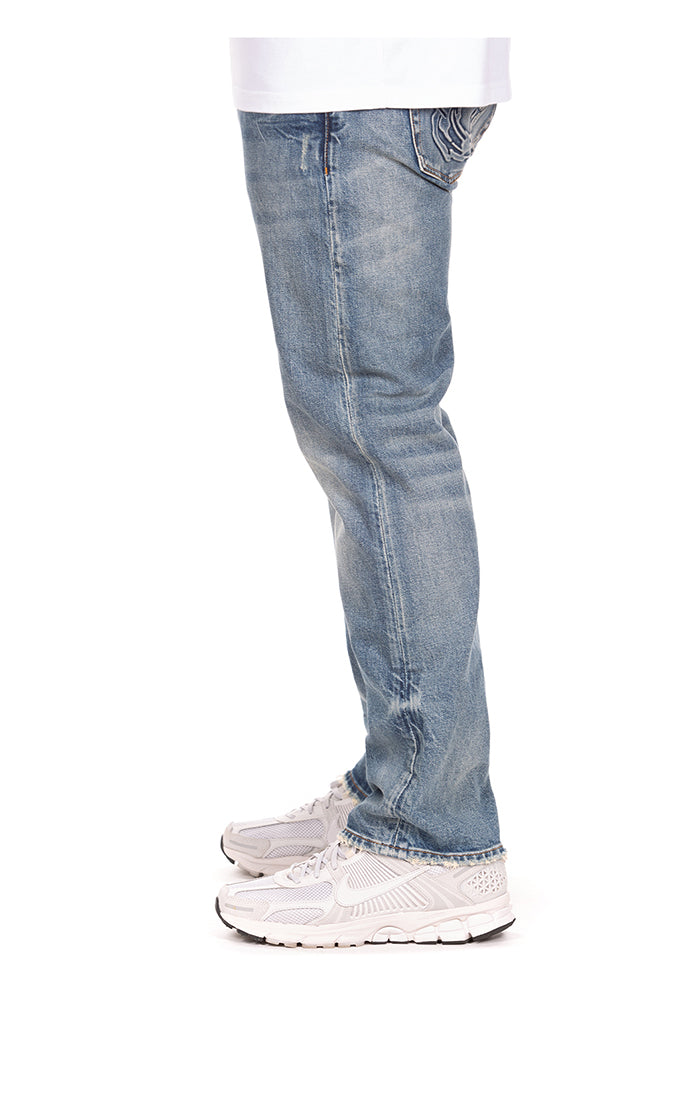 Left Side View of the Billionaire Boys Club BB Trek Jeans (Slim Fit) in Racer