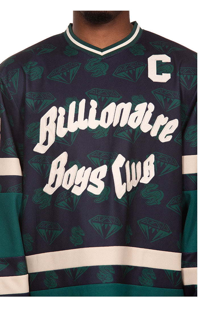 Close-Up View of BB Script of the Billionaire Boys Club BB Celsius Jersey LS Knit in Navy Blazer