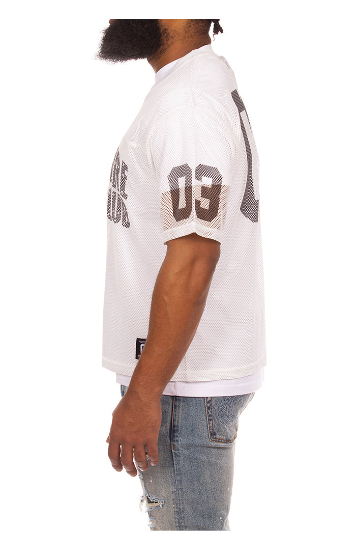 Left side view of BBC Varsity SS Tee in White- Men's Varsity Tee