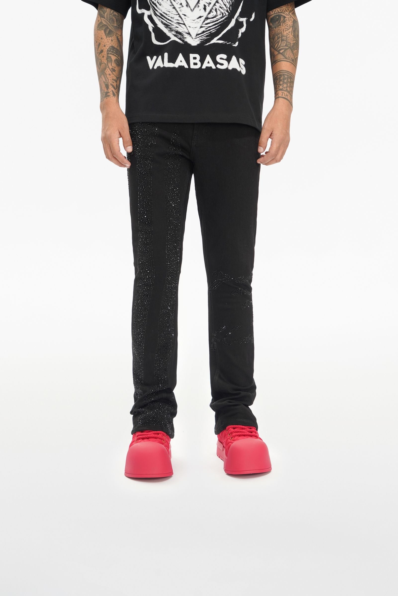 Front Model View of the SCRIPTED STACKED Jeans by Valabasas