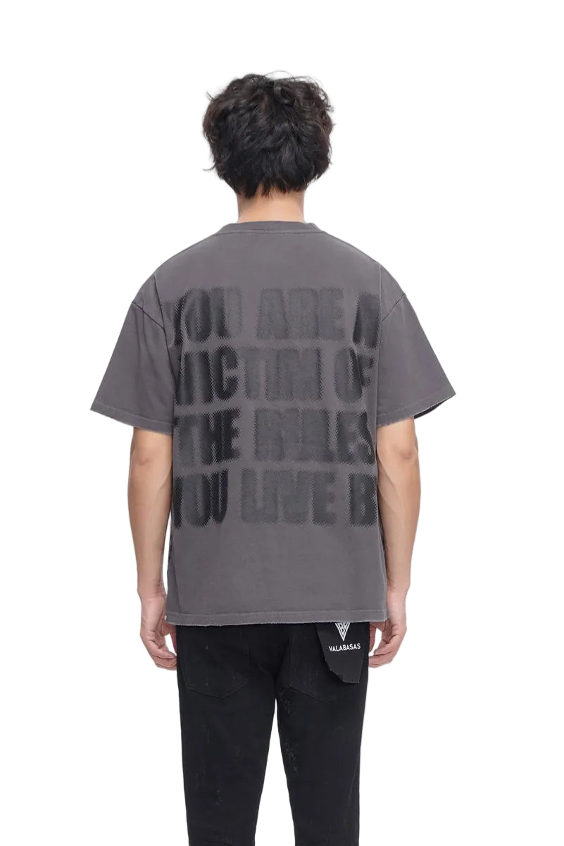 Back View of the "VICTIM" TEE By Valabasas